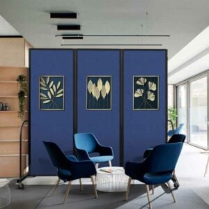 Fully open three panel divider divides a small meeting area for privacy. Tackable artwork has been attached to each panel.